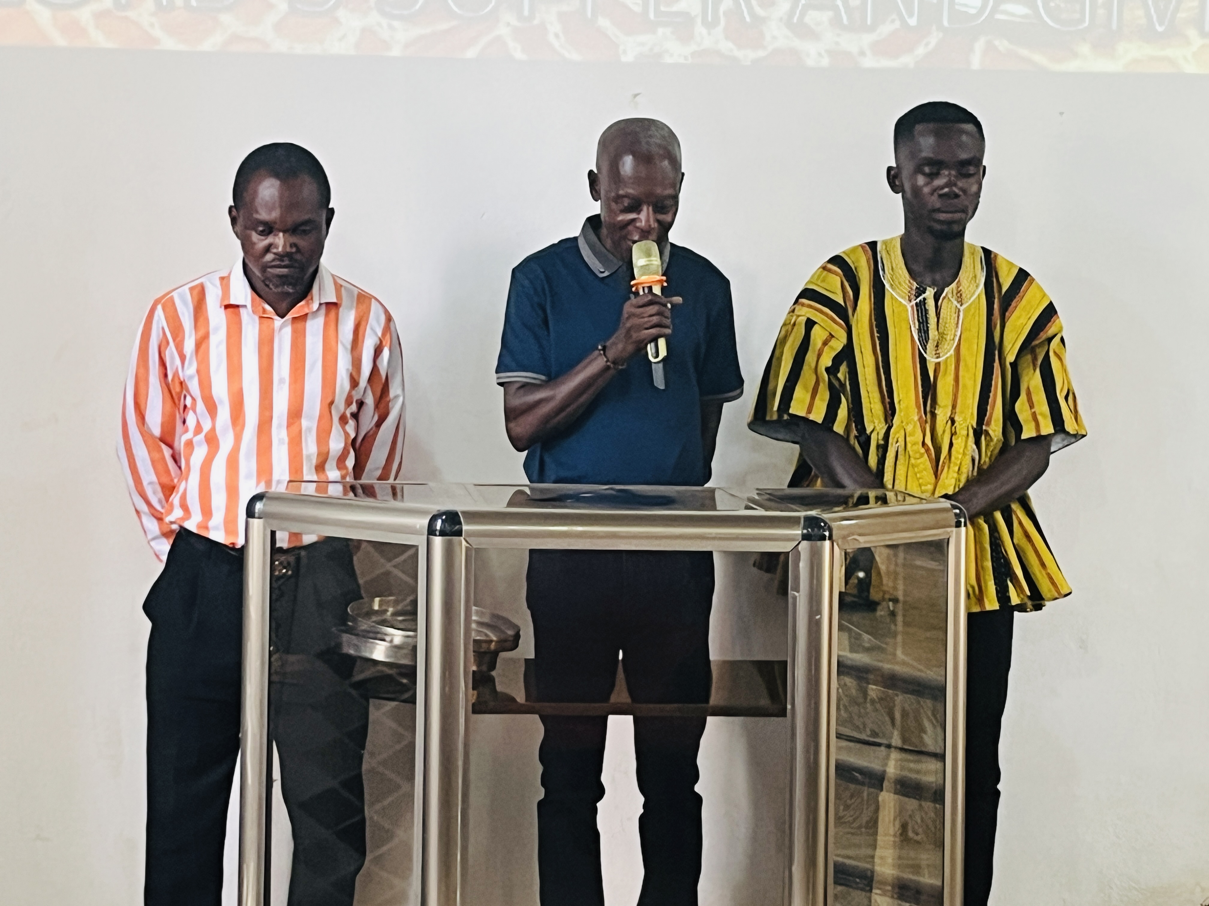 People worshipping in church